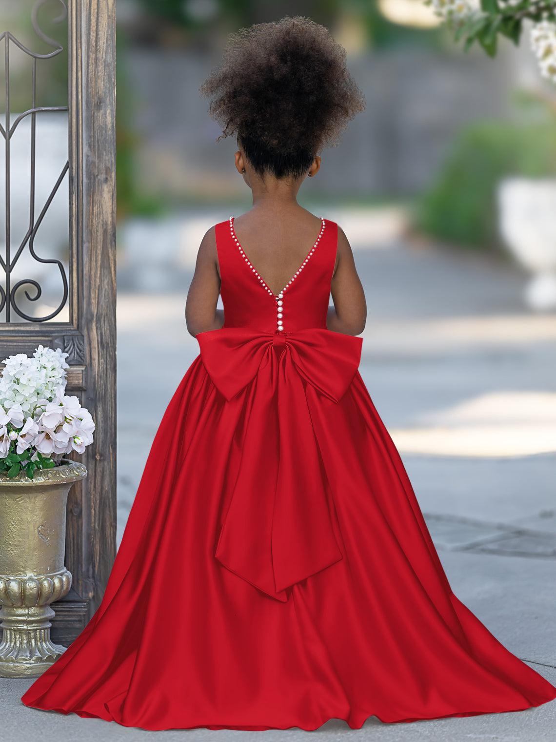 Vestido rosa sin mangas de satén con escote de cuentas y detalle de lazo 