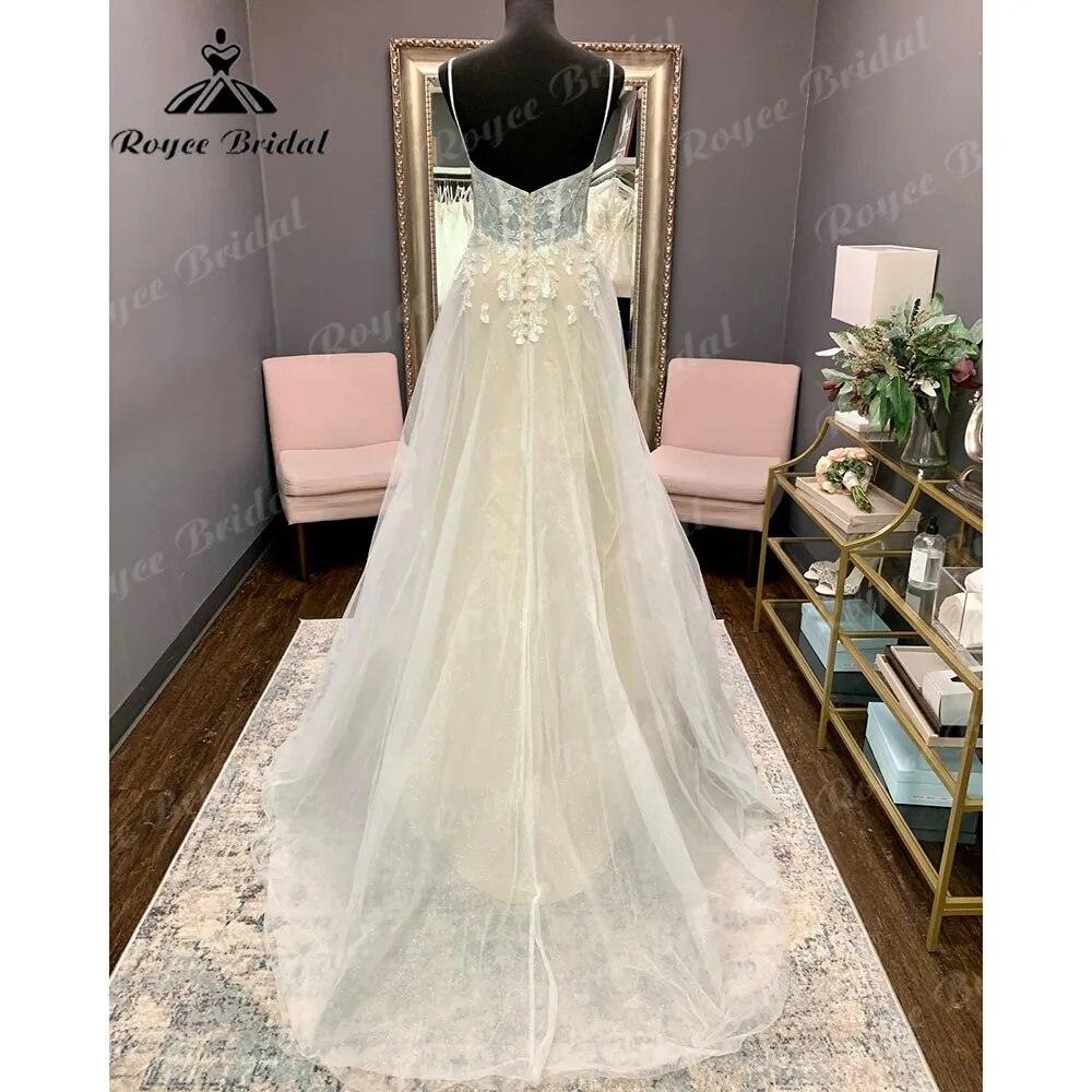 vestido largo de novia con encaje, escote en V, tirantes finos, espalda descubierta, vestido de novia. Elegancia de NumberSea.