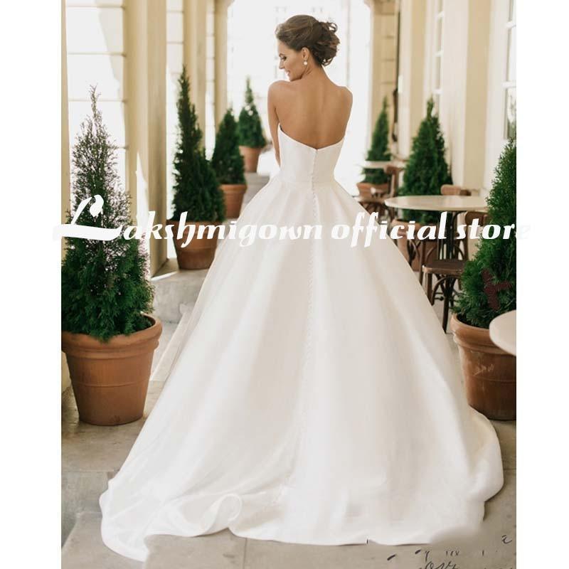 Vestidos de novia románticos de encaje NumberSea con escote en V y corte A con abertura alta