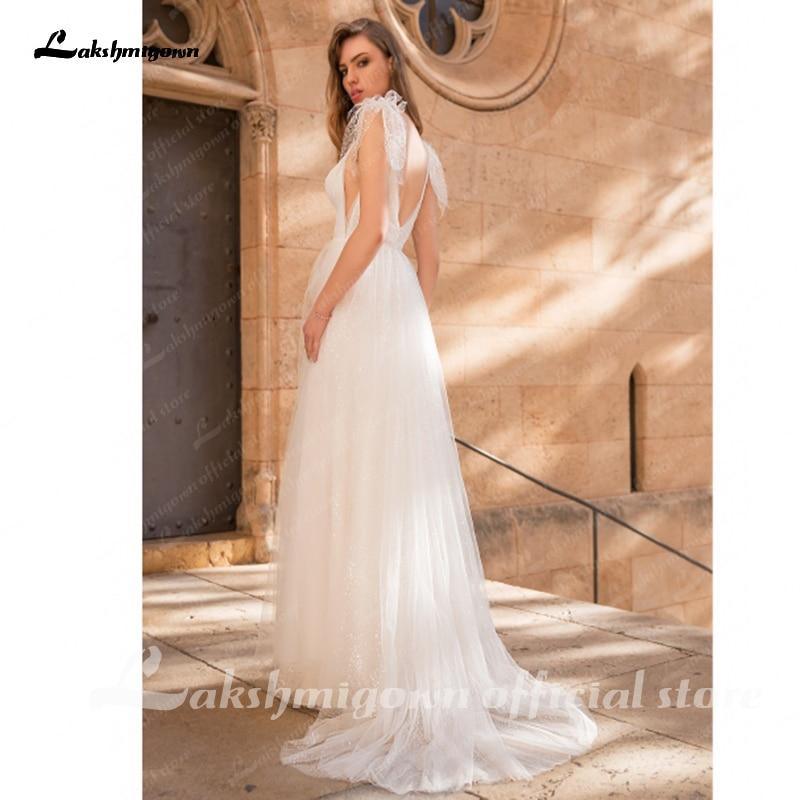 Vestidos de novia bohemios con escote en V, encaje y tul, sin espalda y sexys de NumberSea