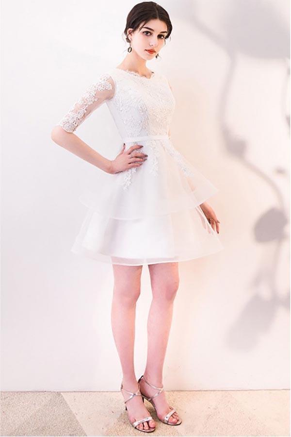 Vestido de fiesta corto de encaje blanco con volantes y media manga