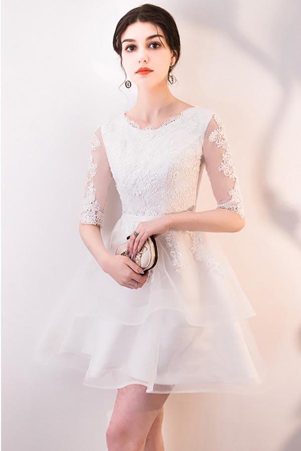 Vestido de fiesta corto de encaje blanco con volantes y media manga