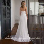 Vestido de novia sencillo de gasa con tirantes finos y escote en V de NumberSea