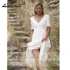 Vestidos de novia sencillos de NumberSea con escote en V, cola larga y manga corta para playa