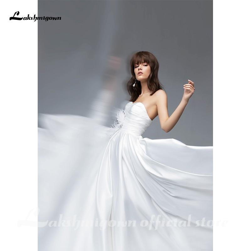 Vestidos de novia sencillos de corte A y escote corazón sin tirantes de NumberSea