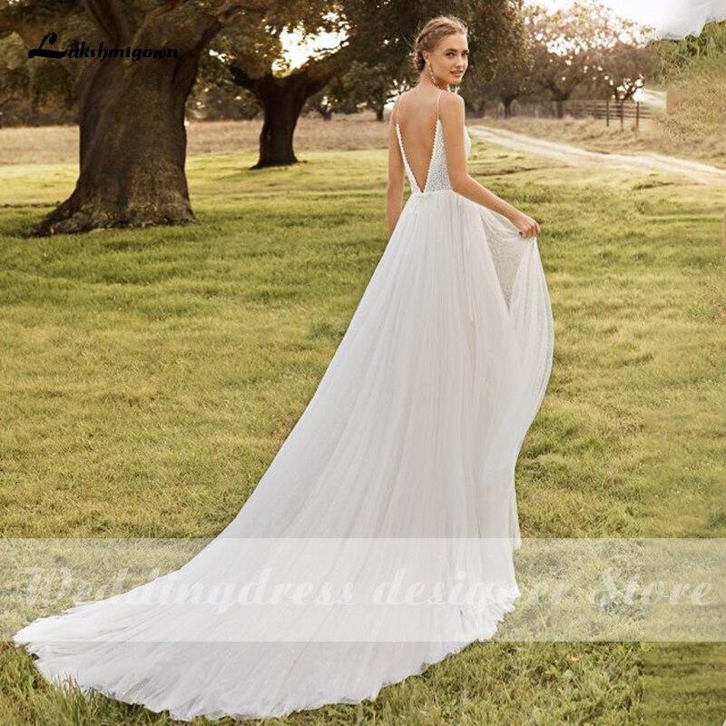 Vestidos de novia bohemios con tirantes finos y escote en V sin espalda de NumberSea