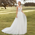 Vestidos de novia bohemios con tirantes finos y escote en V sin espalda de NumberSea