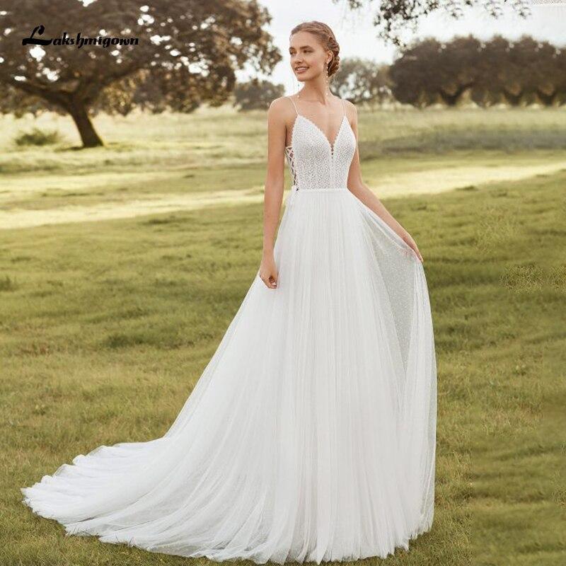 Vestidos de novia bohemios con tirantes finos y escote en V sin espalda de NumberSea