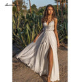 Vestidos de novia NumberSea con tirantes finos, abertura alta, espalda descubierta y cuentas