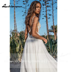 Vestidos de novia NumberSea con tirantes finos, abertura alta, espalda descubierta y cuentas
