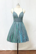 Vestido corto de fiesta con tirantes finos, purpurina verde plateada y bolsillos