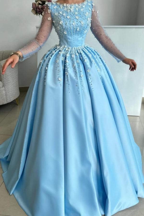 Elegante vestido de fiesta largo azul cielo de satén con pedrería y mangas largas.