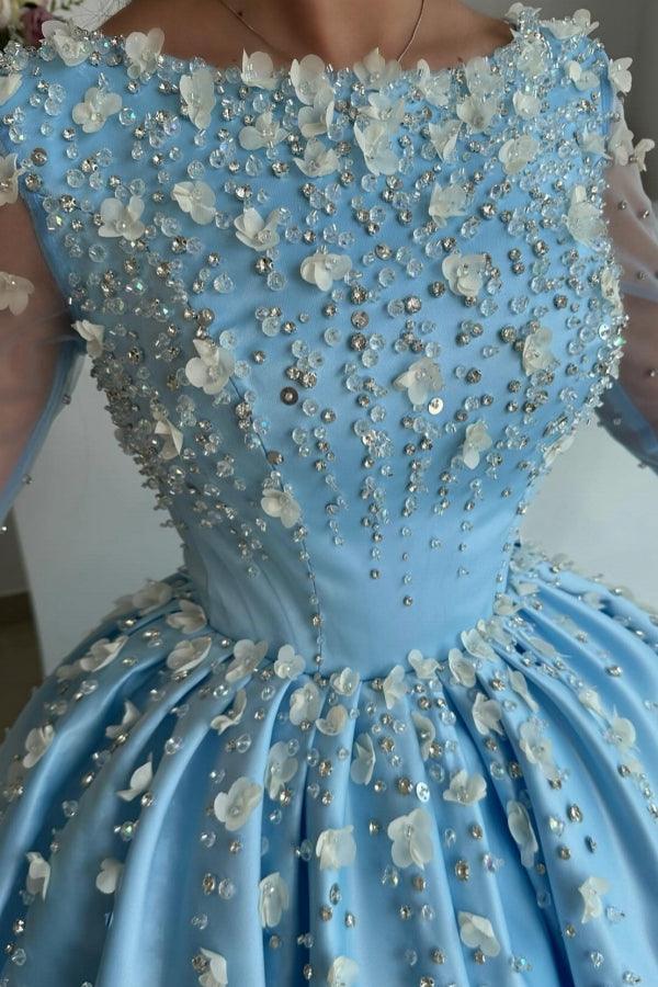 Elegante vestido de fiesta largo azul cielo de satén con pedrería y mangas largas.