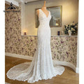 vestidos de novia largos corte sirena/trompeta con escote en V, sin mangas, con espalda abierta y encaje