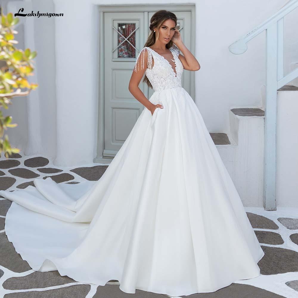 Vestidos de novia de satén con escote en V y corte A de NumberSea, elegantes apliques