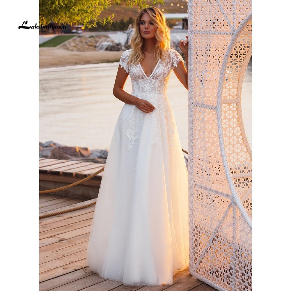 Vestidos de novia NumberSea con escote en V, manga corta, apliques de encaje y espalda abierta