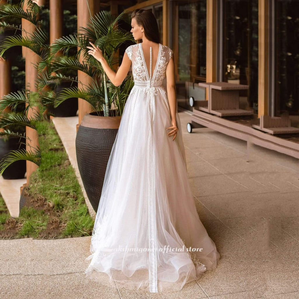 Vestidos de novia NumberSea con escote en V y manga corta en forma de A