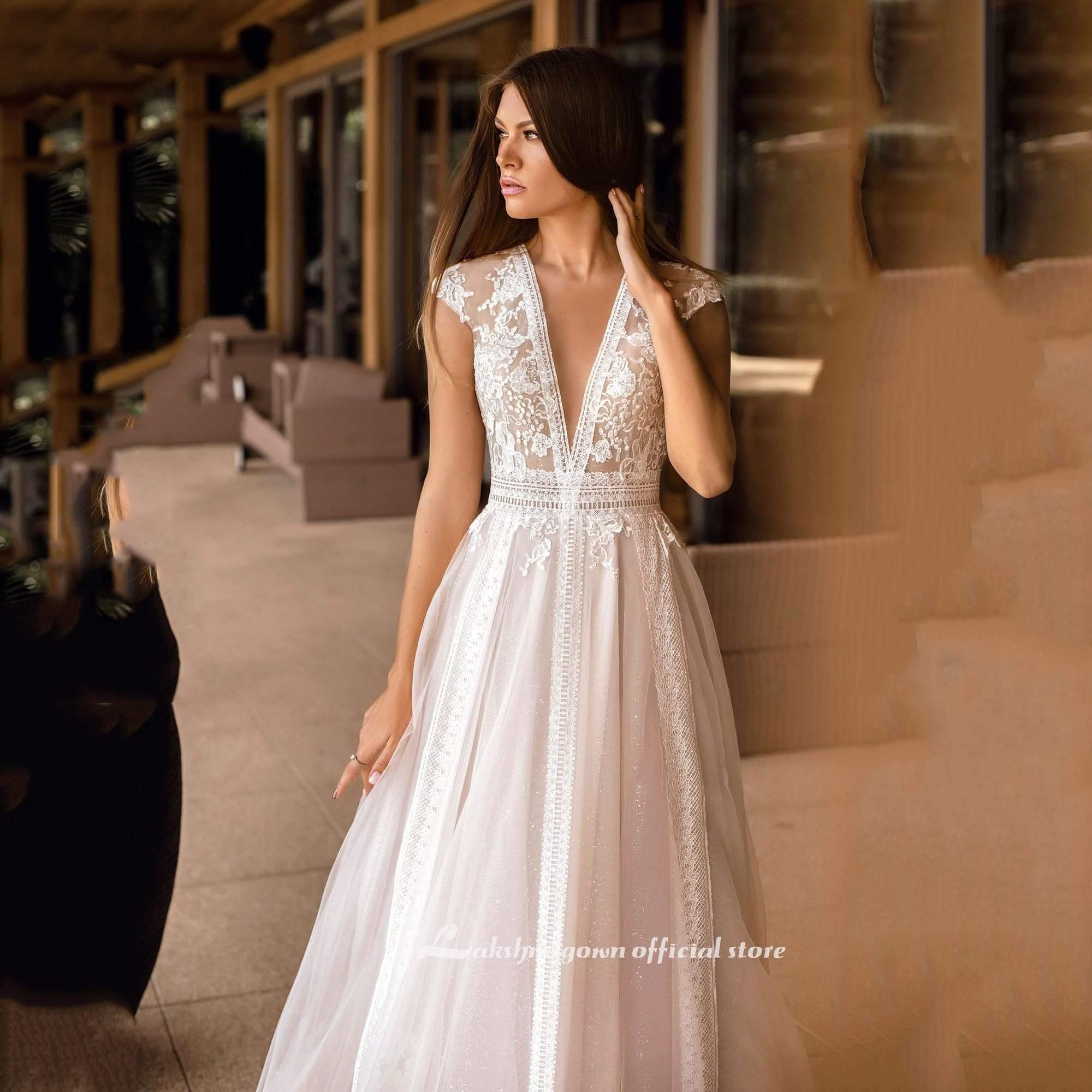 Vestidos de novia NumberSea con escote en V y manga corta en forma de A