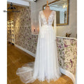 Vestidos Vestido de novia de corte A para playa con escote en V profundo, manga larga, apliques de encaje, tul, cola larga, vestido de recepción de boda