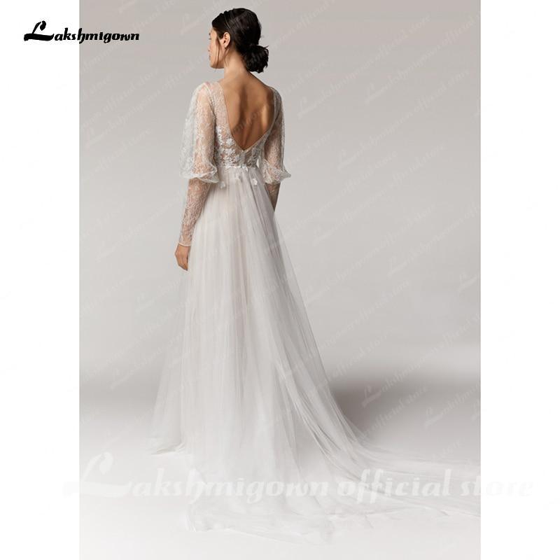 Vestido de novia vintage NumberSea con escote en V profundo color champán, corte A y mangas largas