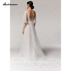 Vestido de novia vintage NumberSea con escote en V profundo color champán, corte A y mangas largas