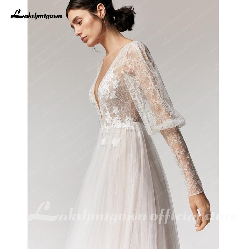 Vestido de novia vintage NumberSea con escote en V profundo color champán, corte A y mangas largas