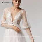 Vestido de novia vintage NumberSea con escote en V profundo color champán, corte A y mangas largas