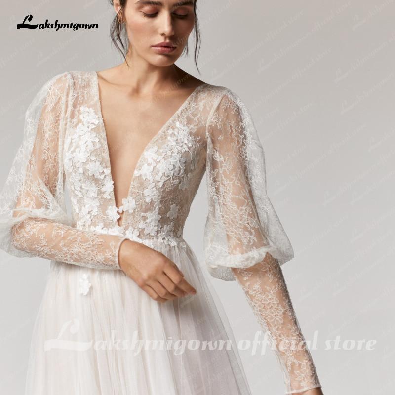 Vestido de novia vintage NumberSea con escote en V profundo color champán, corte A y mangas largas