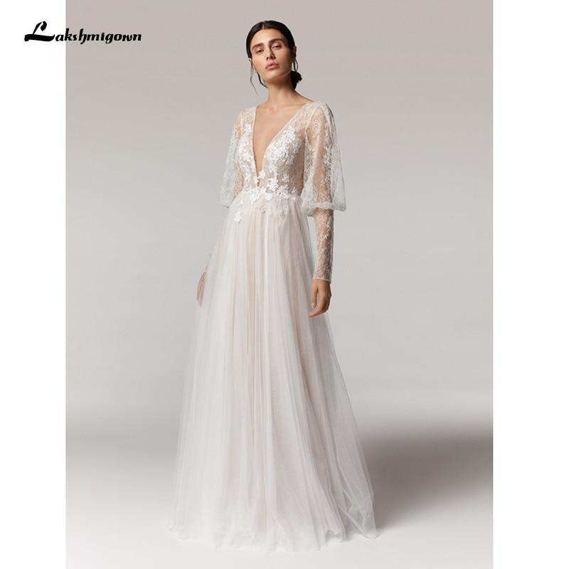 Vestido de novia vintage NumberSea con escote en V profundo color champán, corte A y mangas largas