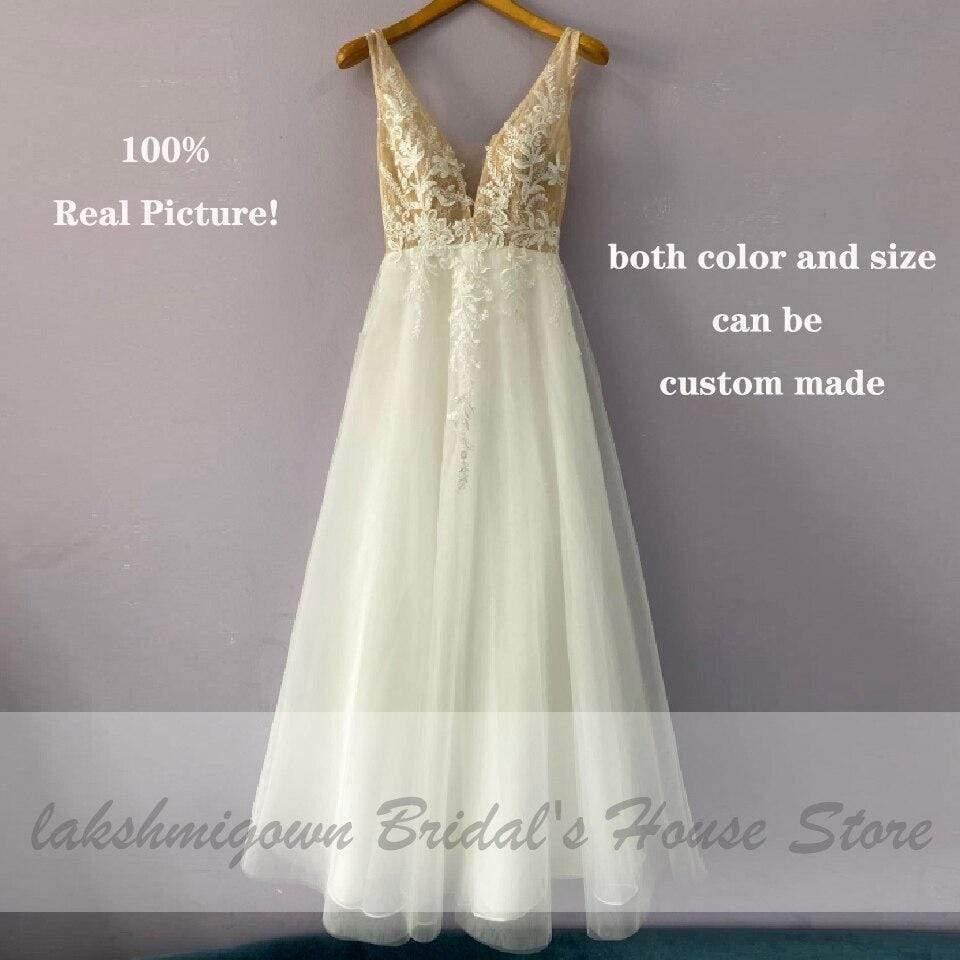Vestido de novia bohemio de encaje vintage NumberSea con escote en V profundo color champán