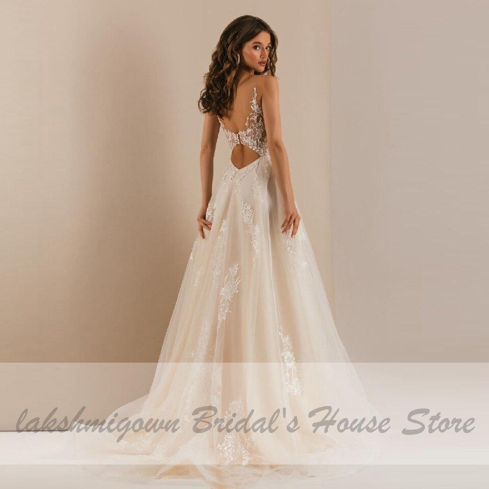 Vestido de novia bohemio de encaje vintage NumberSea con escote en V profundo color champán