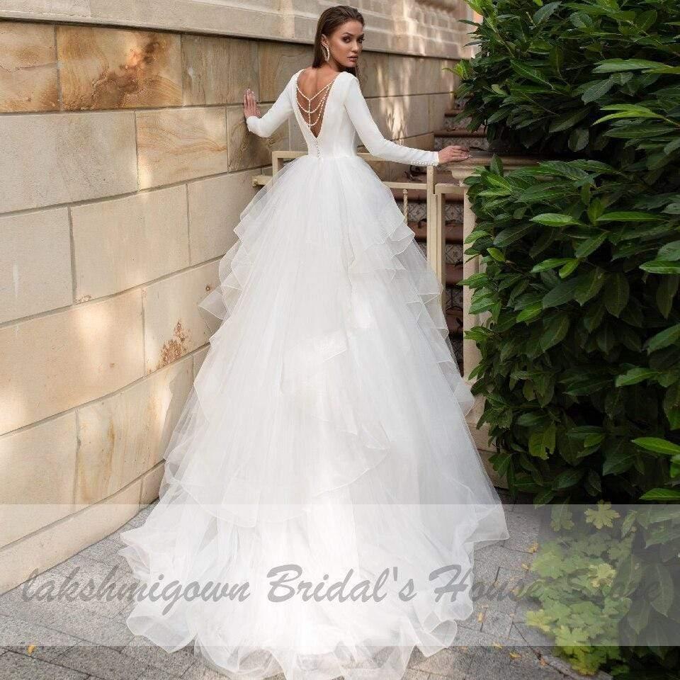 Vestido de novia vintage con volantes y manga larga de NumberSea