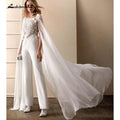 Monos de novia NumberSea con mangas cortas y apliques florales cruzados