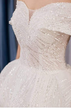 Vestido de novia NumberSea de manga larga con apliques de encaje para playa