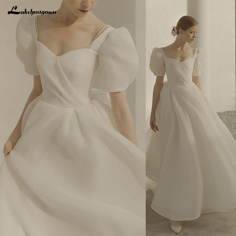 Vestido de novia NumberSea de manga corta abullonada, estilo princesa playero