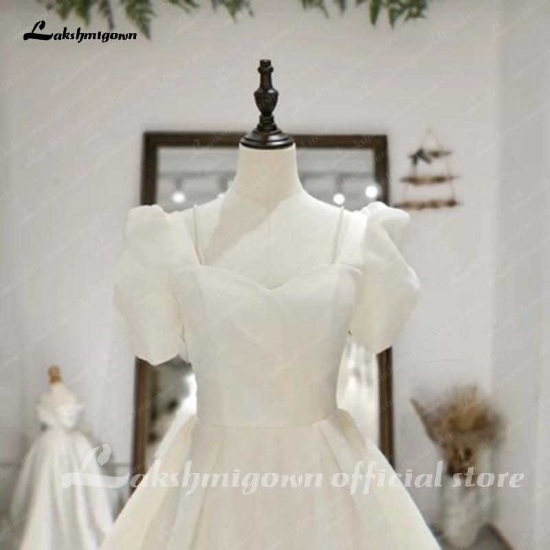 Vestido de novia NumberSea de manga corta abullonada, estilo princesa playero