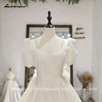 Vestido de novia NumberSea de manga corta abullonada, estilo princesa playero