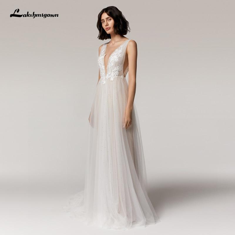 Vestido de novia NumberSea con escote en V, apliques de encaje y tul princesa