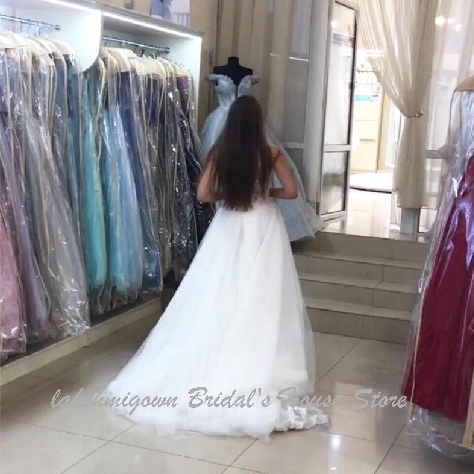Vestidos de novia NumberSea con encaje vintage y corte sirena