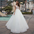Vestidos de novia blancos NumberSea con apliques y lentejuelas y mangas cortas